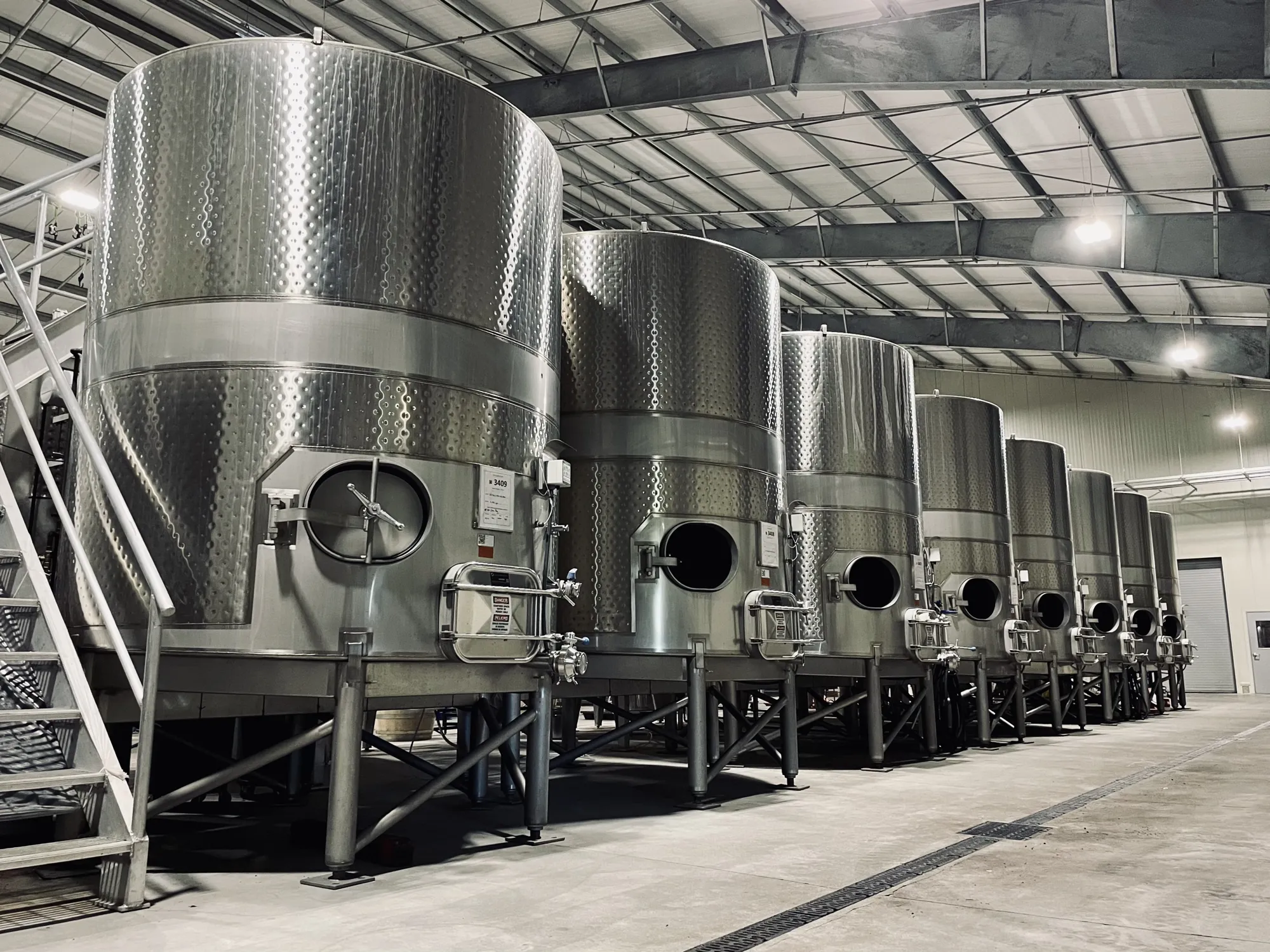 Stainless steel tanks for wine production at Sugarloaf Wine Co.